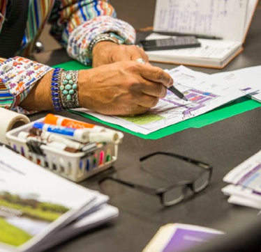 Planning sketches on desk of Anderson Mikos Architects